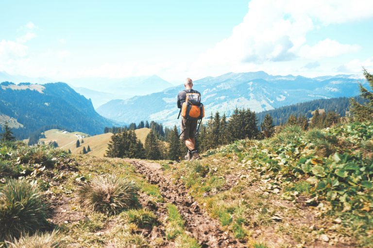 Central and South America Hiking | Man hiking in mountain landscape | Evolve Tours