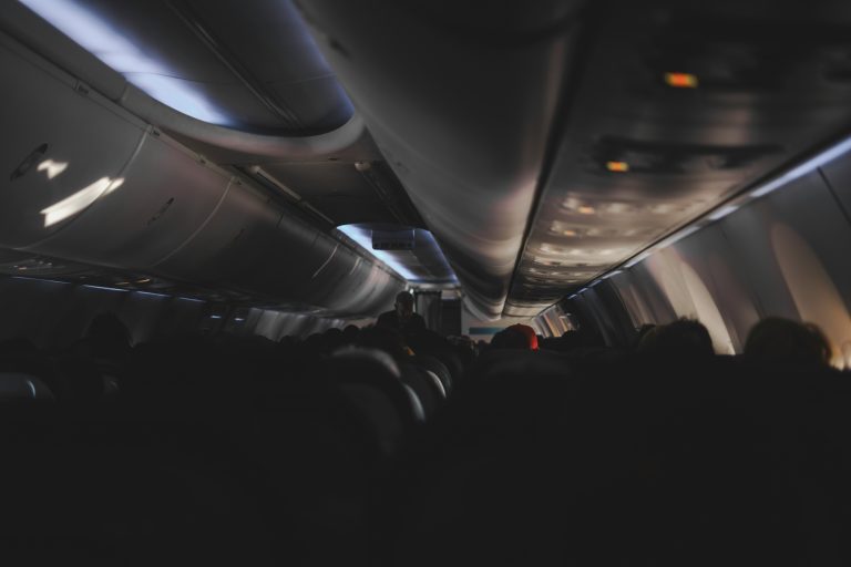Travel Tips for a Long Plane Ride | Airplane interior seating | Evolve Tours