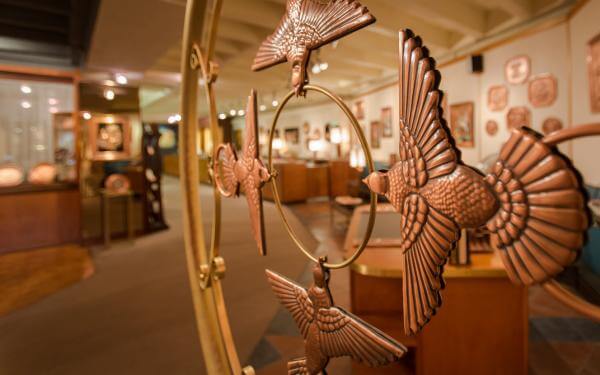 Albert Gilles Copper Museum | Copper bird art display | Evolve Tours