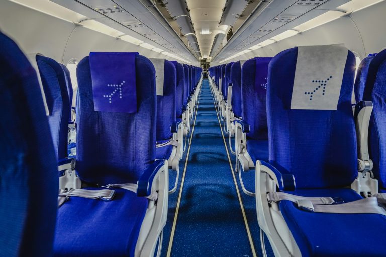 Passengers You Don't Want to Get Stuck Next to | Empty airplane aisle | Evolve Tours