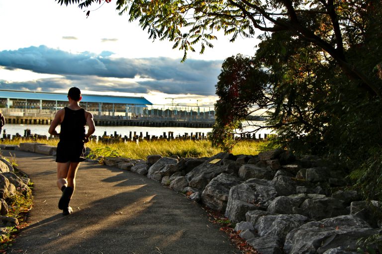 Exercise and Fitness While Traveling | Person running outdoors | Evolve Tours
