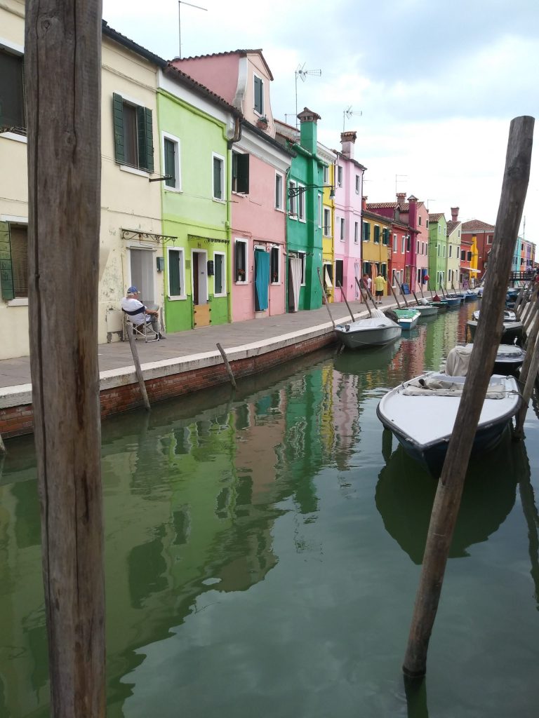 Italy School Trip | Colourful houses on the water | Evolve Tours