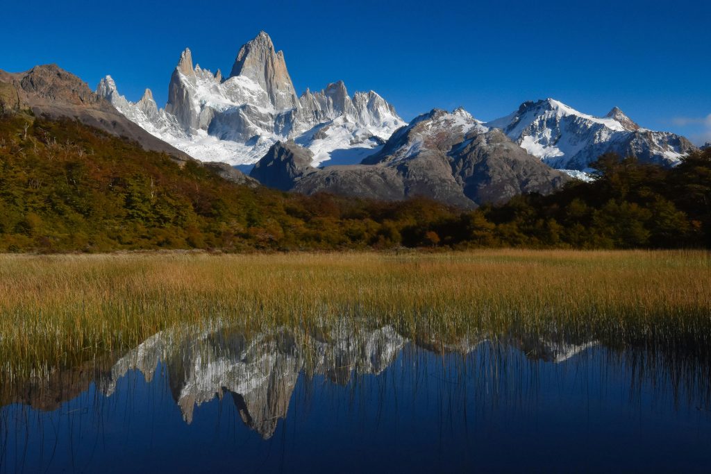 Patagonia Student Trip | Mountains reflecting on lake | Evolve Tours