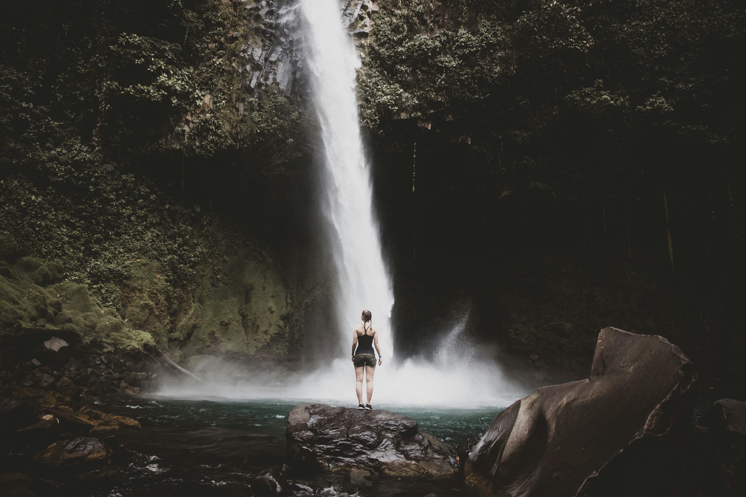 Costa Rica School Trip | Person in front of waterfall | Evolve Tours