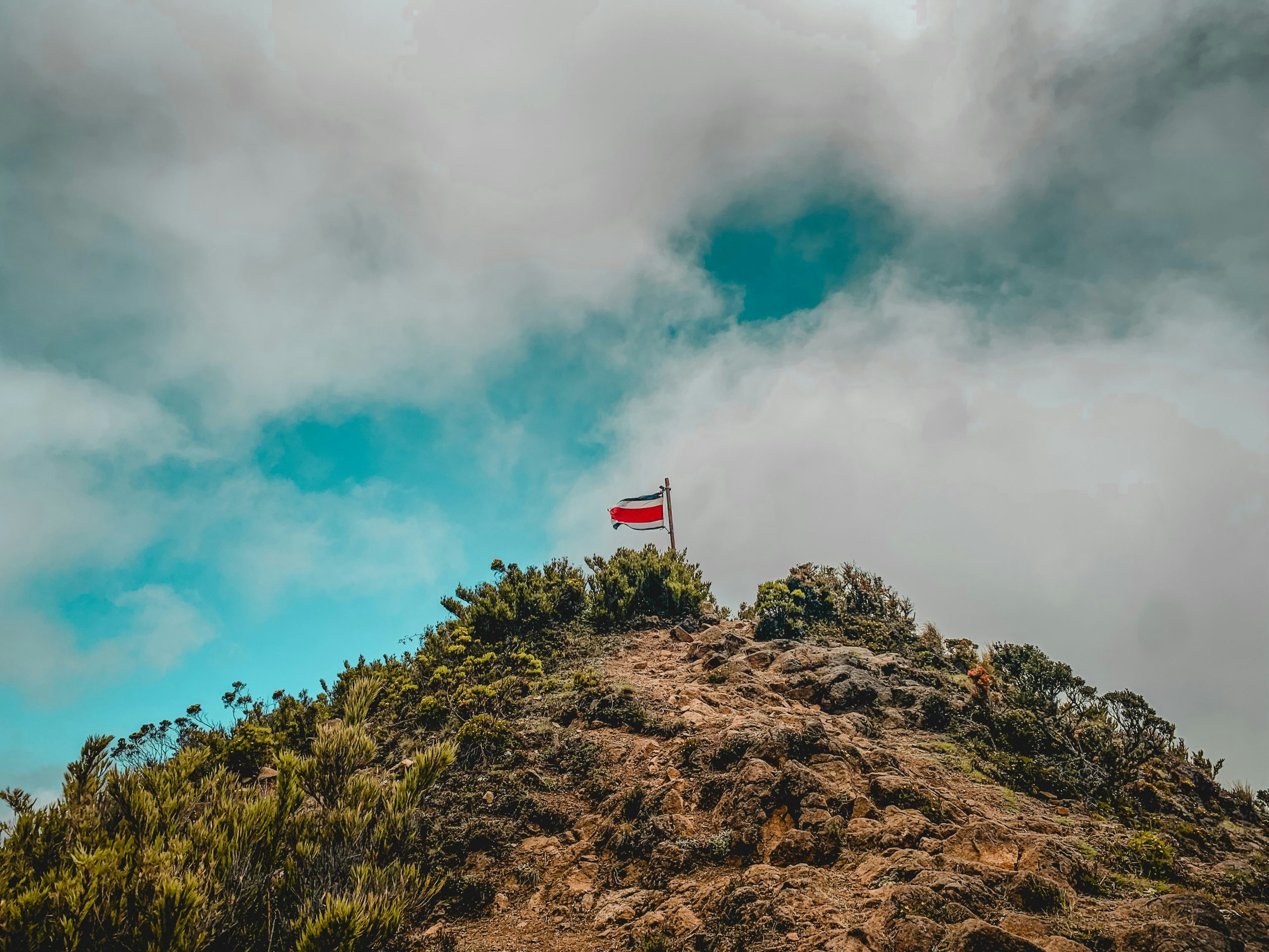 Meaningful Lessons Costa Rica | Costa Rica Flag on Hill | Evolve Tours