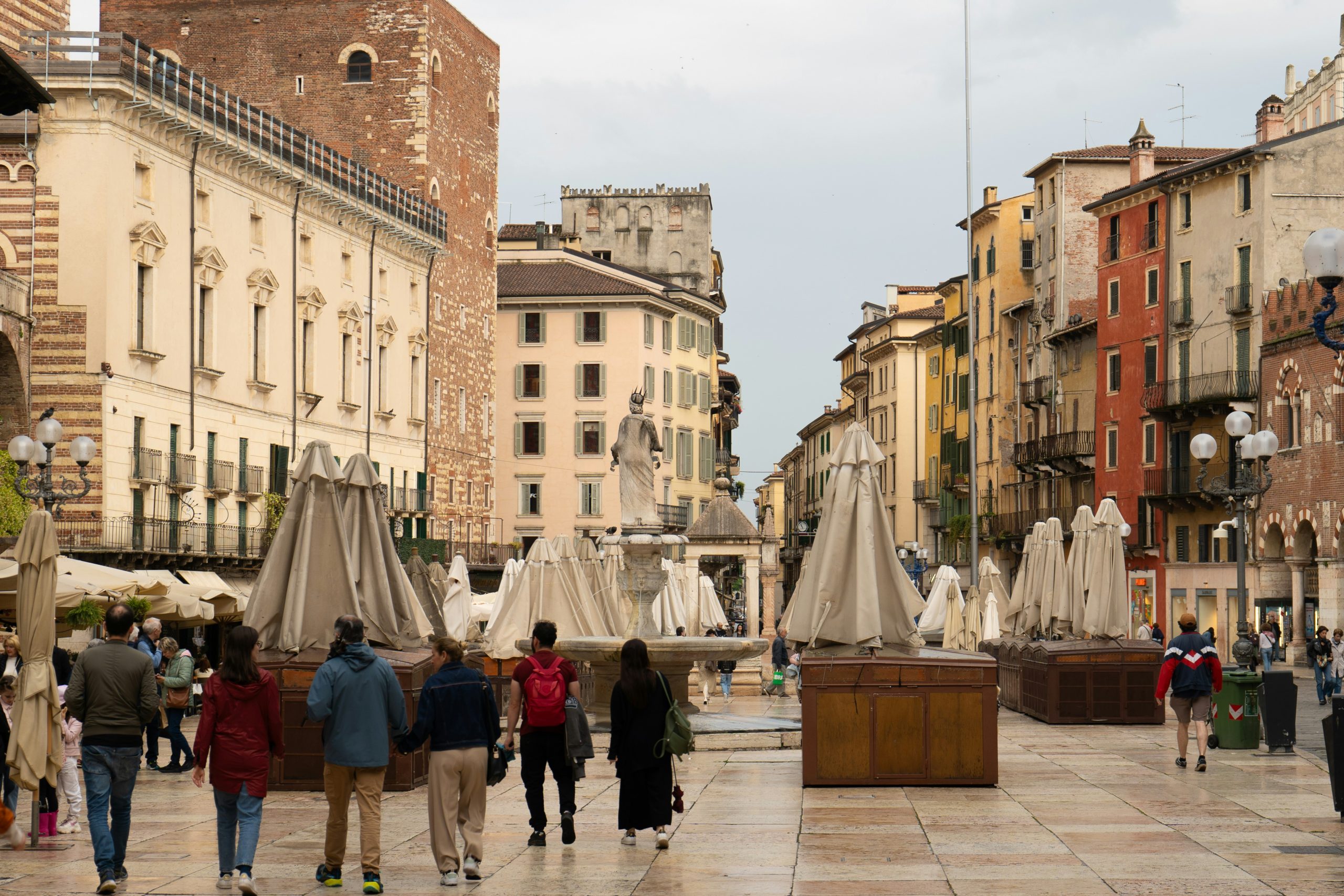 Italian Slang School Trip | People walking in town square | Evolve Tours