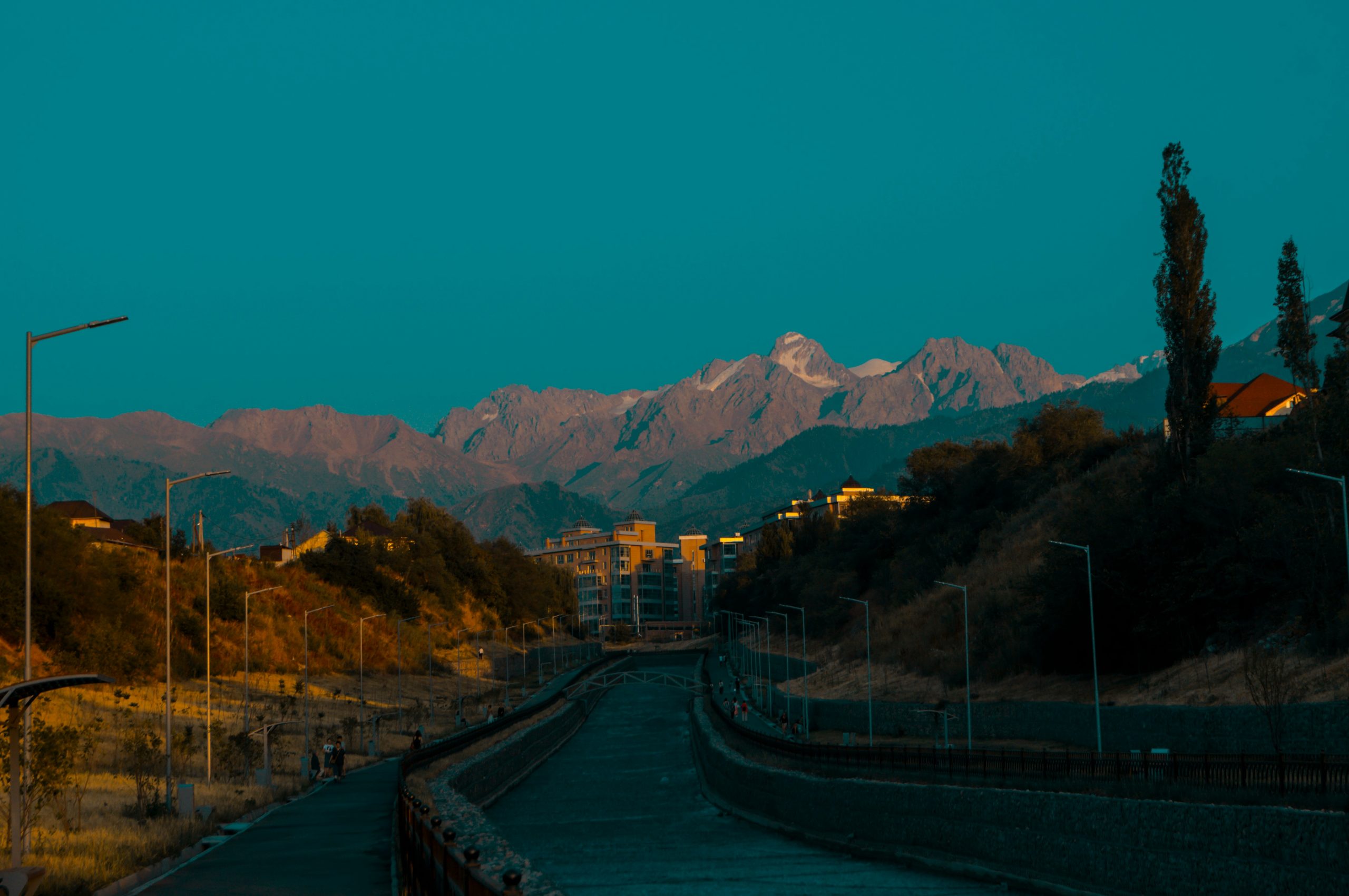 Travel Movies | Scenic backroad with mountains | Evolve Tours