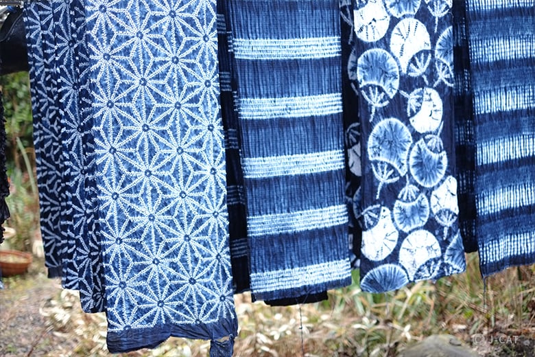 Indigo Dyeing in Japan for Students | Row of fabrics drying | Evolve Tours