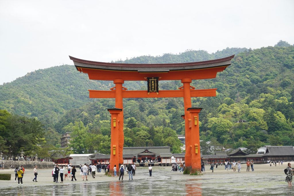 Japan Temples | Students in front of Itsukushima Shrine | Evolve Tours